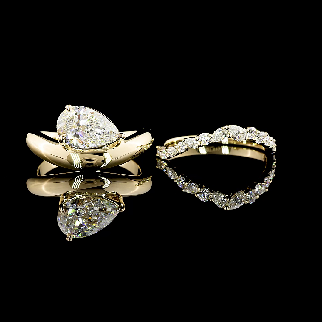 Custom Pear Shape Diamond Twist Ring and Curved Wedding Band