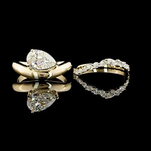 Custom Pear Shape Diamond Twist Ring and Curved Wedding Band Custom Pear Shape Diamond Twist Ring and Curved Wedding Band